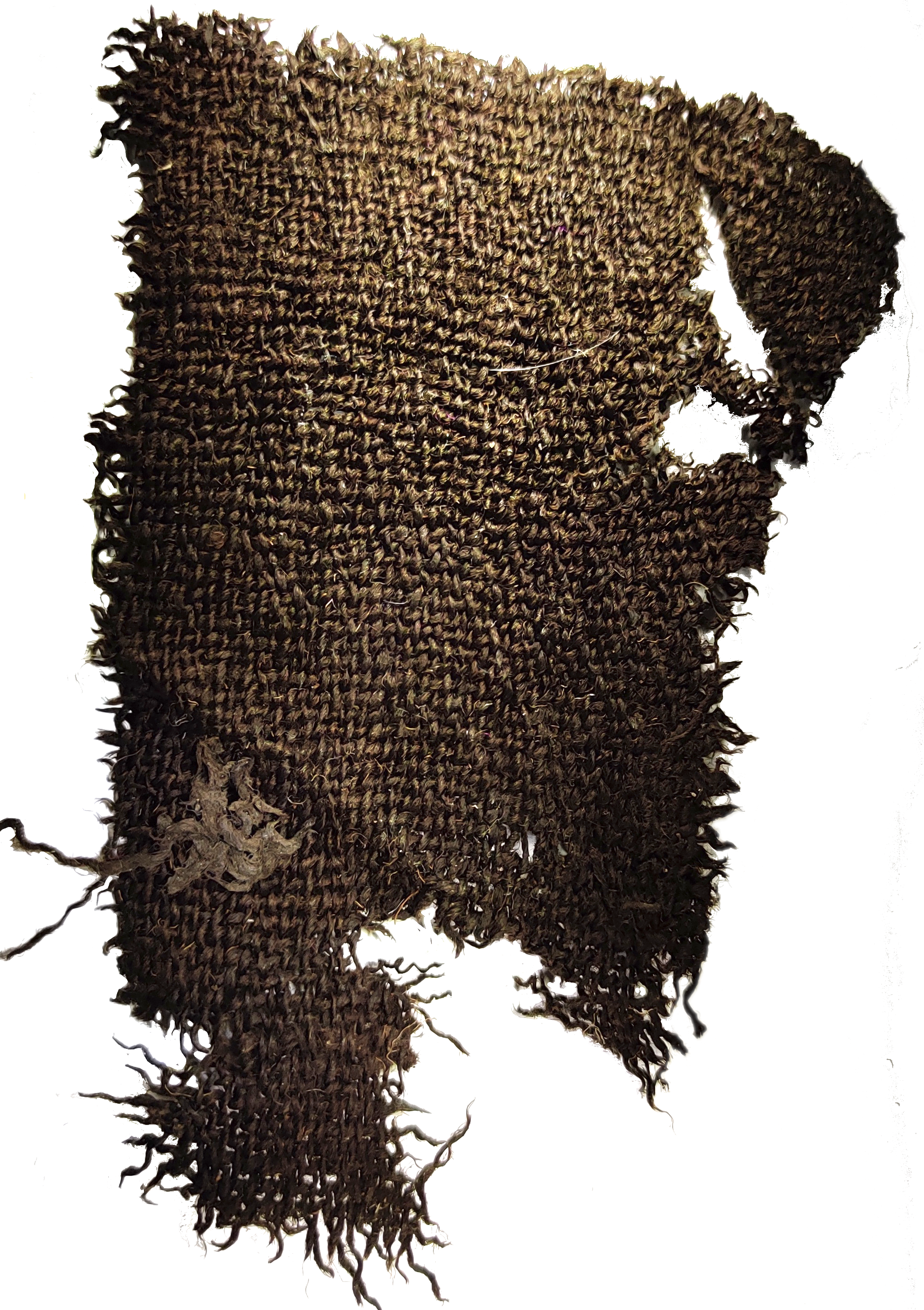 Vanha, rikkinäinen kangaspala